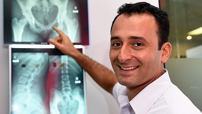 Chiropractor Hooman Zahedi says prolonged periods of sitting affect both internal organs and spinal health. Picture: News Corp